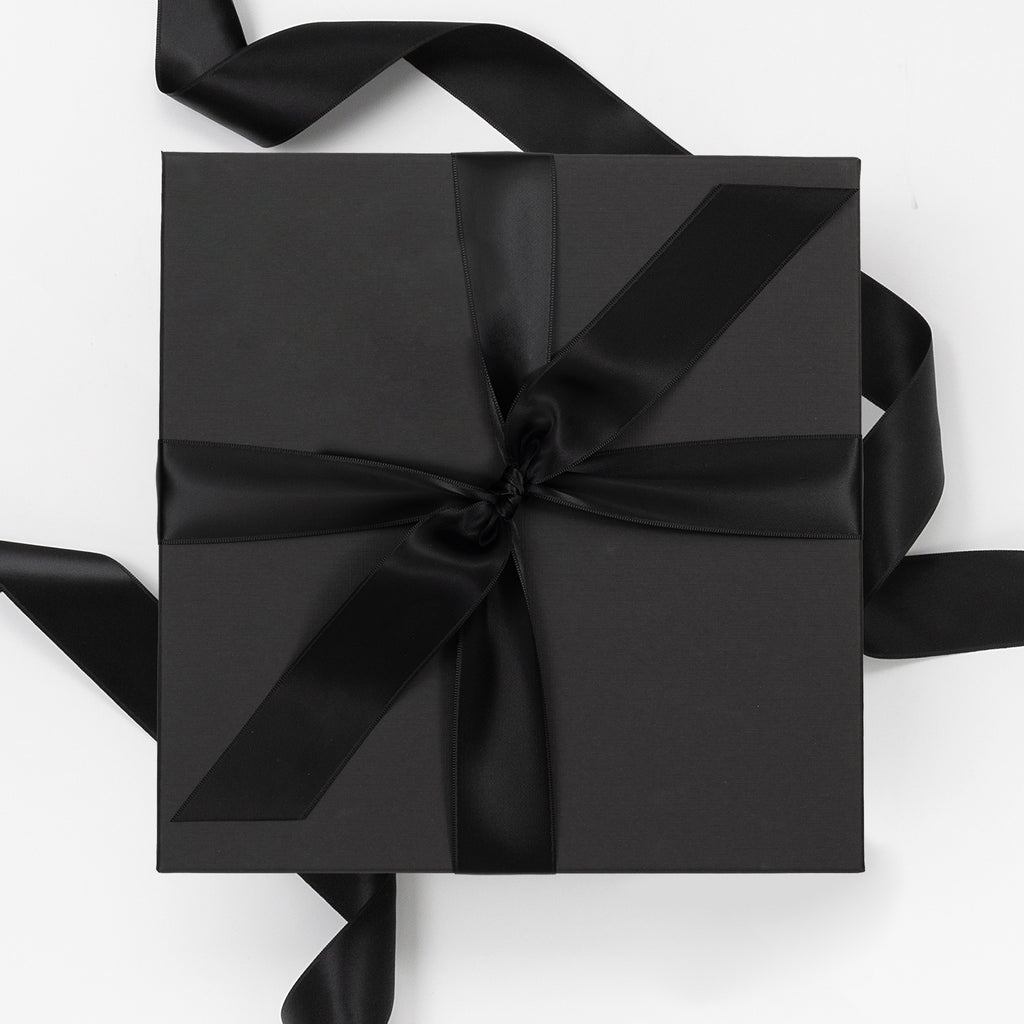 black sleek modern gift box with ribbon